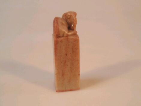 A Chinese carved soapstone desk seal