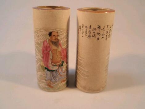 A pair of hand painted porcelain brush pots from the Hsuan Tung years 1909-1912