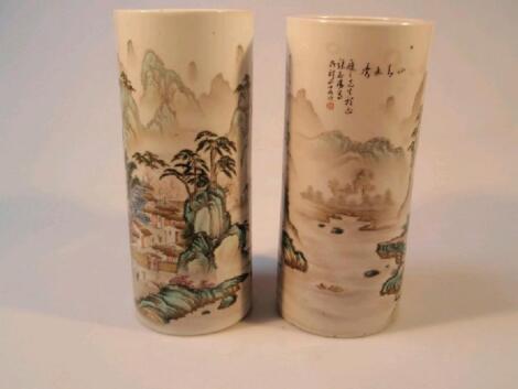 A pair of hand painted porcelain brush pots from the republican period by Zhang Zhi Tang