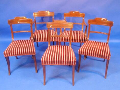 A matched set of twelve 19thC mahogany dining chairs including two carvers