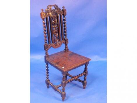 A late 19thC ebonised carved oak single chair