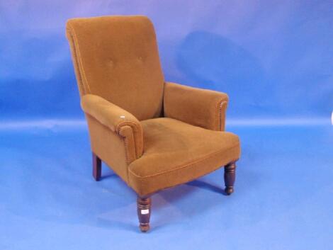 An upholstered arm chair