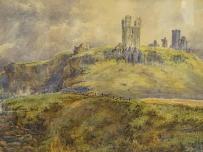 A Woods (19thC). Dunstanburgh Castle, Northumberland, watercolour signed and dated (18)83.