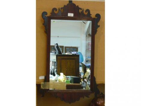 A hanging wall mirror in 18thC cut mahogany frame (glass later)