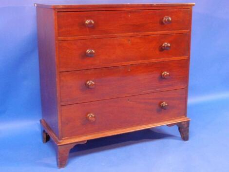 A Georgian figured mahogany chest of four long graduated drawers