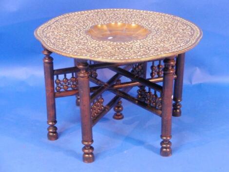 A large Indian brass tray top table