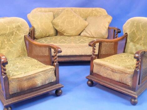 A 1930's barley twist beech framed berger? three piece suite