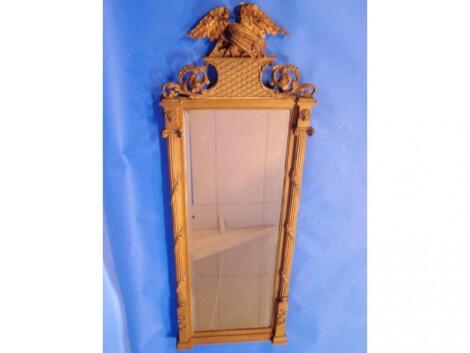 An antique Regency style gilt framed bevelled pier glass