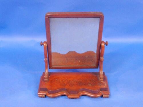 A Victorian figured mahogany rectangular toilet mirror