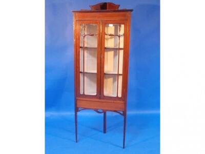 A Sheraton revival standing corner display cabinet