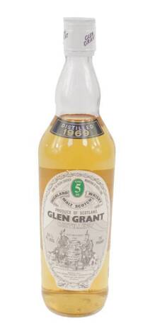 A bottle of Glen Grant Distillery Five Year Old Malt Scotch Whisky 1969, bears full labels.