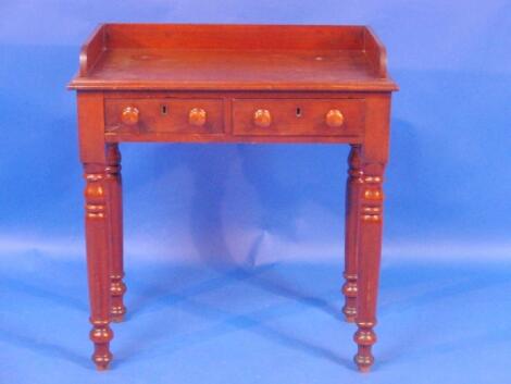 A small Victorian mahogany washstand