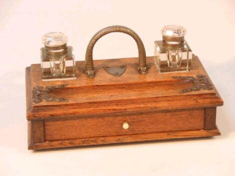 A late Victorian oak desk stand