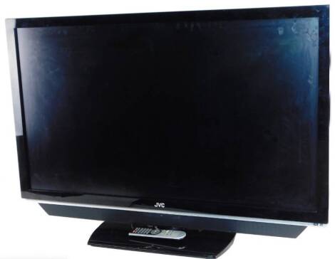 A JVC 48 inch television, in black trim with remote control and wire.