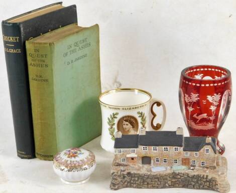 A Bohemian ruby glass goblet, decorated with buildings, trees and fawn, on circular foot, 14cm H, a small quantity of other china, Cornish cottage by R Tellman Newland, The Quay Mouscholc, Royal Commemorative Doulton mug, lidded jar and Jardine (D R) In Q