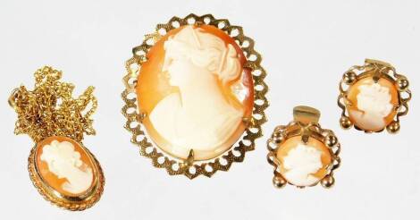 A selection of cameo jewellery, to include an oval cameo brooch, in 9ct gold pierced frame, 4cm x 3cm, a pair of 9ct gold clip on earrings and a gold plated cameo necklace and chain. (4)