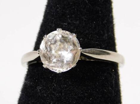 A 9ct white gold dress ring, with single imitation diamond stone, in a claw setting, with pierced and open work shoulders and ring head, maker C.P, ring size J½, 1.9g all in.