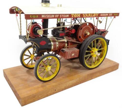 A 20thC scale model traction engine Tom Varley Gasburn steam tractor, on oak plinth, 24cm H, 36cm W, 14cm D.