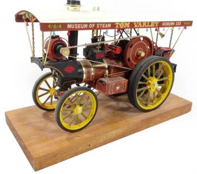 A 20thC scale model traction engine Tom Varley Gasburn steam tractor, on oak plinth, 24cm H, 36cm W, 14cm D.