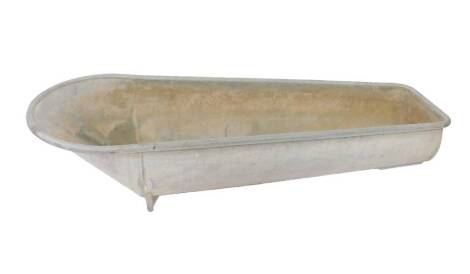 A Constantia retro galvanized coffin shaped roll-top bath, with embossed makers mark CONSTANTIA SA to the foot, 184cm L.