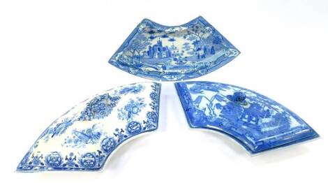 Three early 19thC Spode curved supper dishes, two with covers, including the Willow pattern, another with scholistic emblems, and the third with a castle and exotic trees, impressed or printed marks.