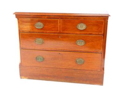 A George III mahogany chest, with boxwood line inlay, possibly the top of a chest on chest, with two short and two long drawers, raised on a plinth base, 79cm H, 102cm W, 56cm D.