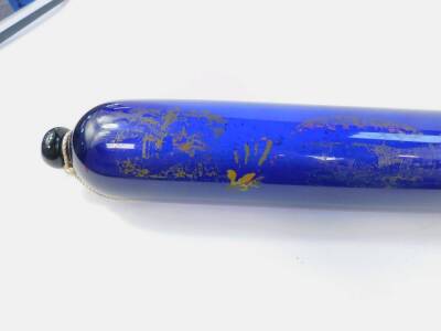 A Victorian Bristol blue glass over-sized rolling pin, with partial gilt and enamel decoration, and the legend forget-me-not, the script "The Lose Of Gold Is Great..", 70cm L. - 2