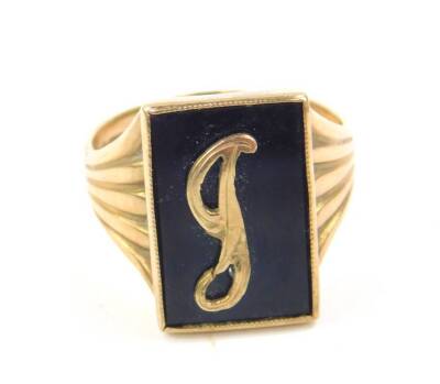 A 9ct gold and black onyx gentleman's signet ring, initialled engraved, size U, 6.0g.