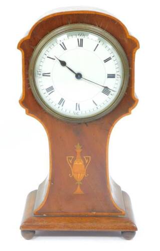 An Edwardian mahogany mantel clock, with a domed enamel Roman numeric dial, 9cm Dia, in an inlaid stylised balloon case, raised on quadruple supports.