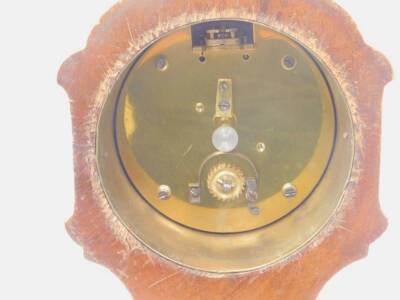 An Edwardian mahogany mantel clock, with a domed enamel Roman numeric dial, 9cm Dia, in an inlaid stylised balloon case, raised on quadruple supports. - 2