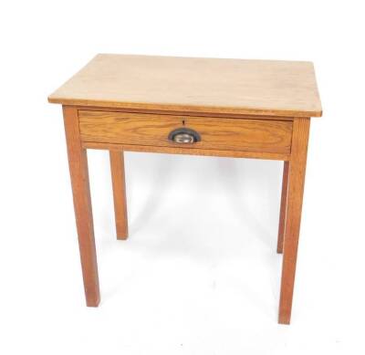 An early 20thC oak side table, with a single frieze drawer, raised on tapering square legs, 76cm H, 76cm W, 50cm D.