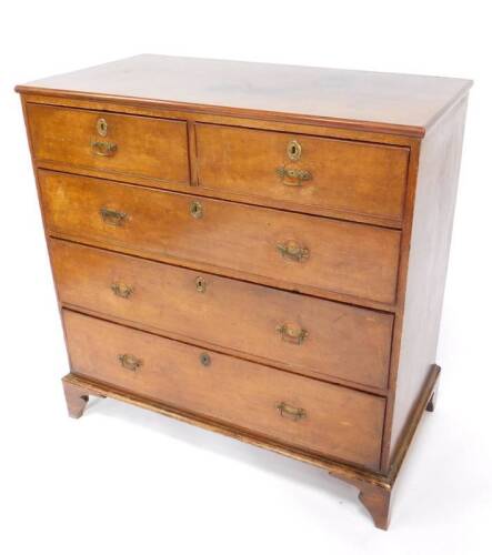 A George III oak chest of drawers, with two short over three long graduated drawers, raised on bracket feet, 105cm H, 106cm W, 56cm D.