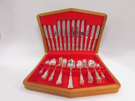 A Smith Seymour Limited silver plated half canteen of cutlery, decorated in the Kings pattern, cased.