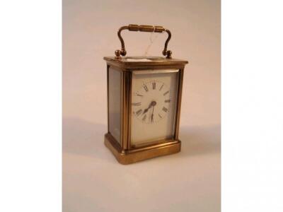 A gilt brass carriage timepiece