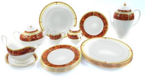 A Wedgwood porcelain part dinner tea and coffee service, decorated in the Tortoiseshell pattern, comprising teapot, coffee pot, cream jug, sucrier, sauce boat on stand, six dinner and dessert plates.