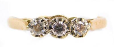 A 9ct gold and diamond three stone ring, approx 0.5cts, size N, 2.2g.