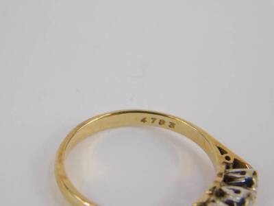 A 9ct gold and diamond three stone ring, approx 0.5cts, size N, 2.2g. - 3