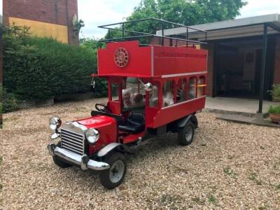 A half scale open top showcase double decker bus, c1983, with automata clock, and fully animated magic roundabout figures, the coach having a Triumph Marina petrol engine, automata with music and lights timed to half hour performance, together with mounte - 2