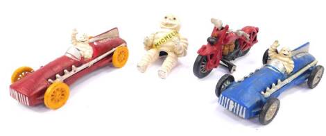 Four cast models, comprising Michelin Racing Cars (x2), The Michelin Man, and a motorcycle.