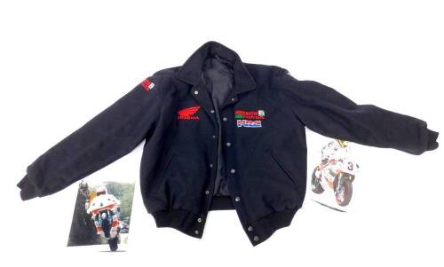 A Castrol Honda Racing jacket, size L, together with a signed limited edition print of Joey Dunlop after Alan Sanderson 1994, Honda RC 45, and a photograph of Joey Dunlop. (3)