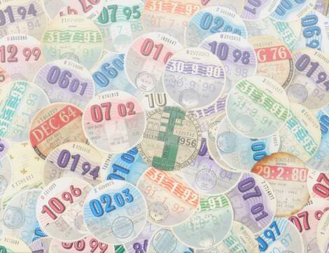 A montage of late tax discs, ranging from 1980s to the Millennium.