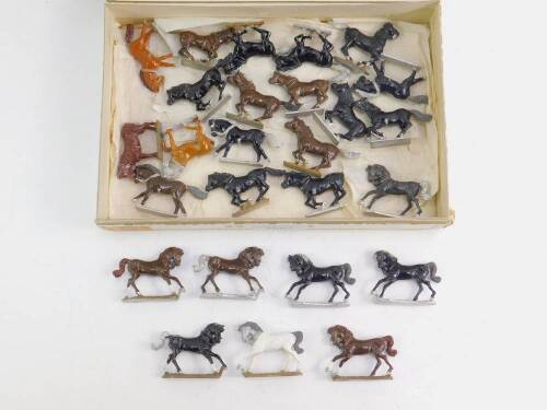 Various 20thC lead cavalry horses, various colours to include black, 4cm H, etc. (qty)