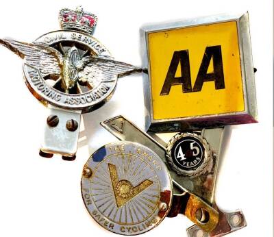 A collection of three car grille badges, comprising AA, Civil Service Motoring Association, Veteran Motorists, and an Award for Safer Cycling badge. (4)