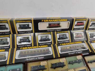 Graham Farish and Peco N gauge coaches and rolling stock, all boxed. (qty) - 4