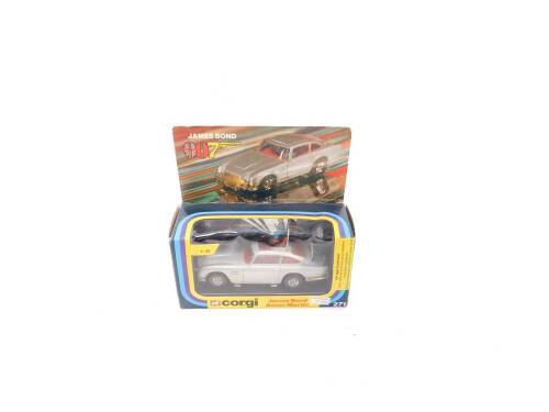 A Corgi James Bond 007 Aston Martin DB5 (First Issue), silver body work with spoke wheels, gold front and rear bumpers, with two figures, boxed number 271.