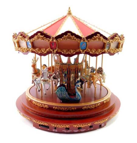 A Mr Christmas Royal Marquee Carousel, with ACDC adaptor.