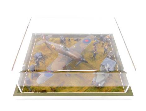 A WWII British Model Aircraft Tableau, showing a Hawker Hurricane, ground and air crew, perspex cased, 31cm x 26.5cm.