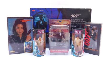 A James Bond 007 Turbo Racing Set, Licence To Thrill, Side Show Collectables figure of Yai Lin, Dragon Figure of James Bond from Golden Eye, further of James Bond from Tomorrow Never Dies, and two limited edition collectors figures from Dr No, all boxed. 