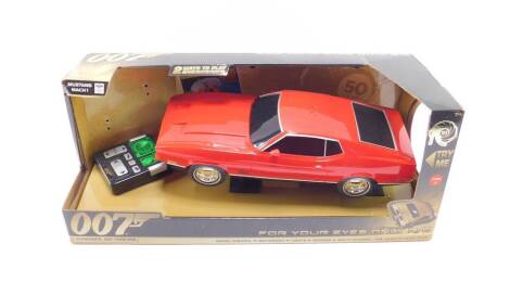 A remote control 007 Mustang Mach 1, from Diamonds Are Forever, radio controlled with lights sound and multi channel for head to head play, boxed.