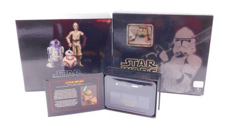 A Gentle Giant Ltd Star Wars Clone Trooper, deluxe collectable bust, Kotobukiya R2D2 and C3PO with BB-8 1/10th scale pre-painted model kit, and a Star Wars Yoda Lightsaber, scaled replica, all boxed. (3)